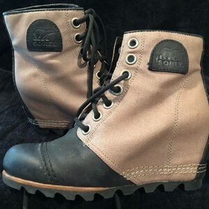 Brand new, never worn SOREL Arctic wedge booties.